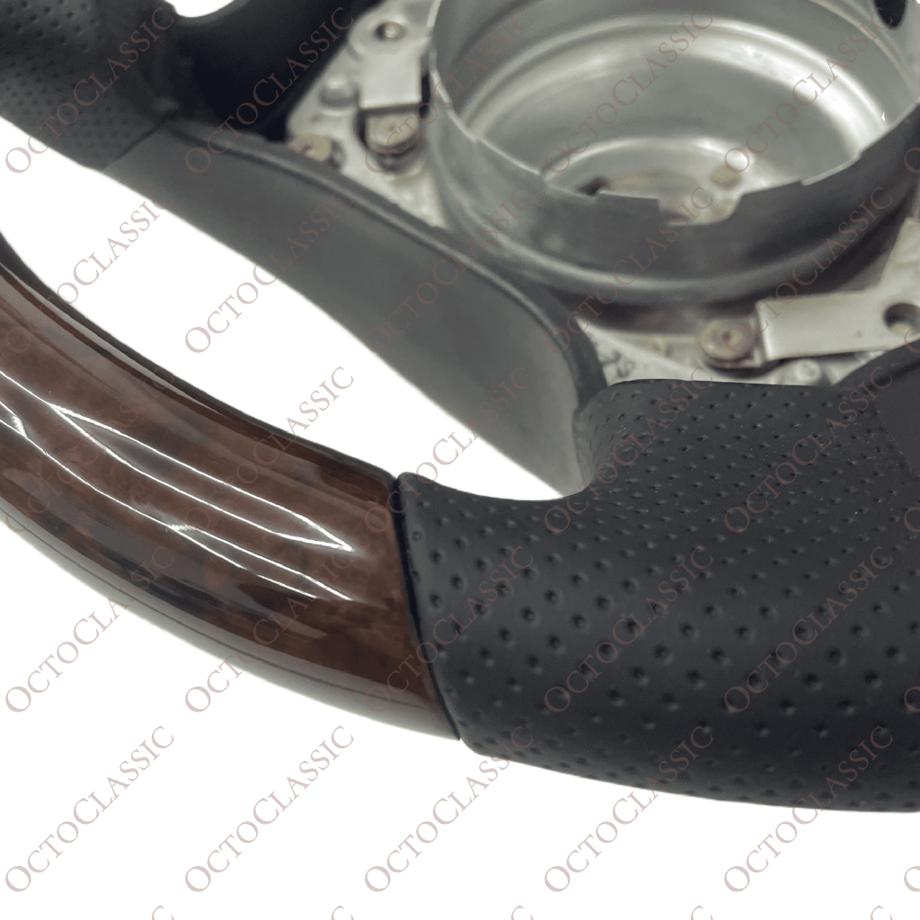 Mercedes W124 / R129 / W140 / W202 / W210 / W463 Brabus Style Steering Wheel Dark Burl Walnut And Black Leather A1404605303 Mercedes W124 / R129 / W140 / W202 / W210 / W463 Brabus Style Steering Wheel Dark Burl Walnut And Black Leather A1404605303