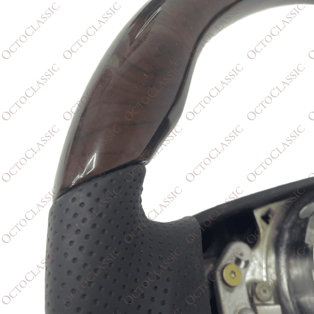Mercedes W124 / R129 / W140 / W202 / W210 / W463 Brabus Style Steering Wheel Dark Burl Walnut And Black Leather A1404605303 Mercedes W124 / R129 / W140 / W202 / W210 / W463 Brabus Style Steering Wheel Dark Burl Walnut And Black Leather A1404605303