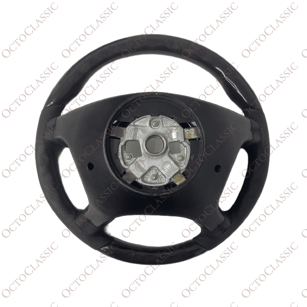 Mercedes W124 / R129 / W140 / W202 / W210 / W463 Brabus Style Steering Wheel Dark Burl Walnut And Black Leather A1404605303 Mercedes W124 / R129 / W140 / W202 / W210 / W463 Brabus Style Steering Wheel Dark Burl Walnut And Black Leather A1404605303